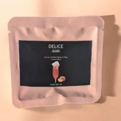 Bombe à paillettes barbe à papa saveur pêche en sachet rose Délice Bar avec garniture