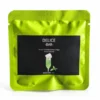 Délice Bar mint-flavoured candyfloss glitter bomb pouch on a light background.